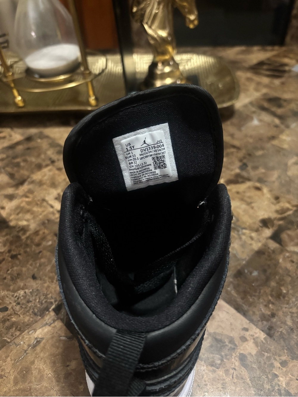 Nike Black and White Mid-Top Sneaker with Padded Collar